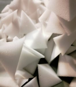 Detailed photo of the white TetraSnow foam flakes. The fine air pockets are clearly visible.